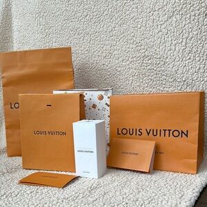 100% authentic Louis Vuitton shopping bags